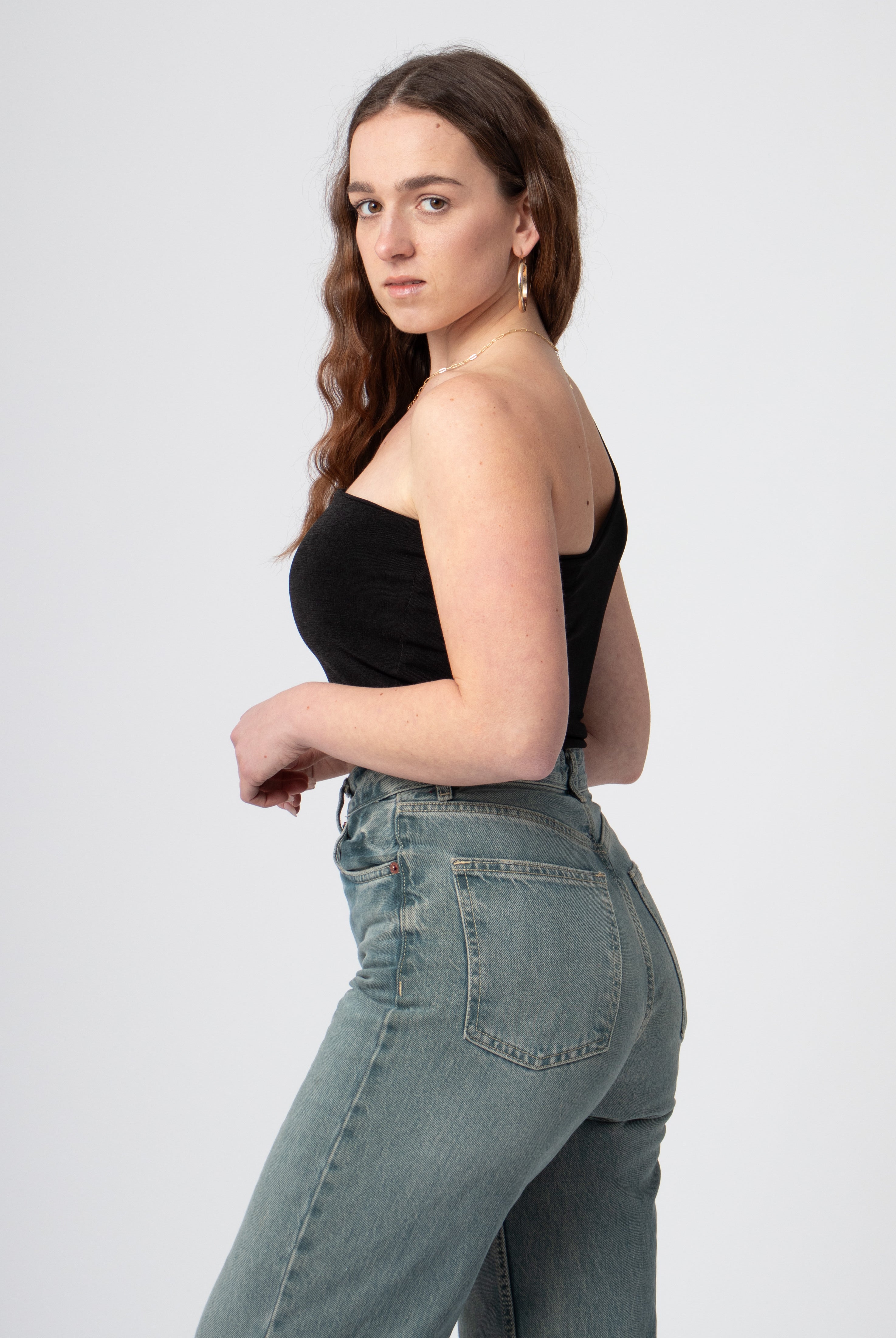 one shoulder glitter top zwart glanzend