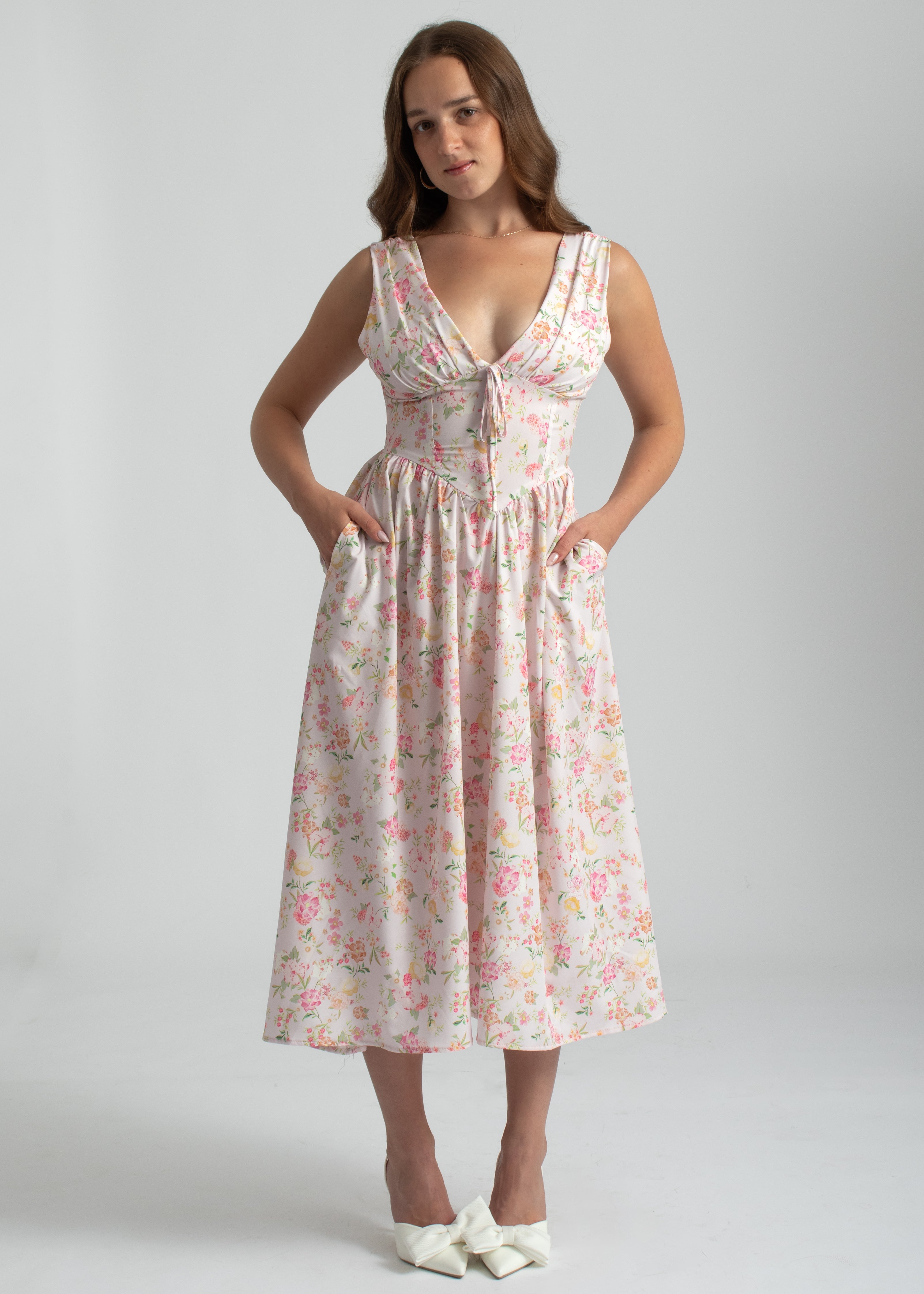 bloemenprint midi jurk roze lage hals met zakken