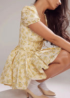 Gele bloemenprint jurk v hals mini