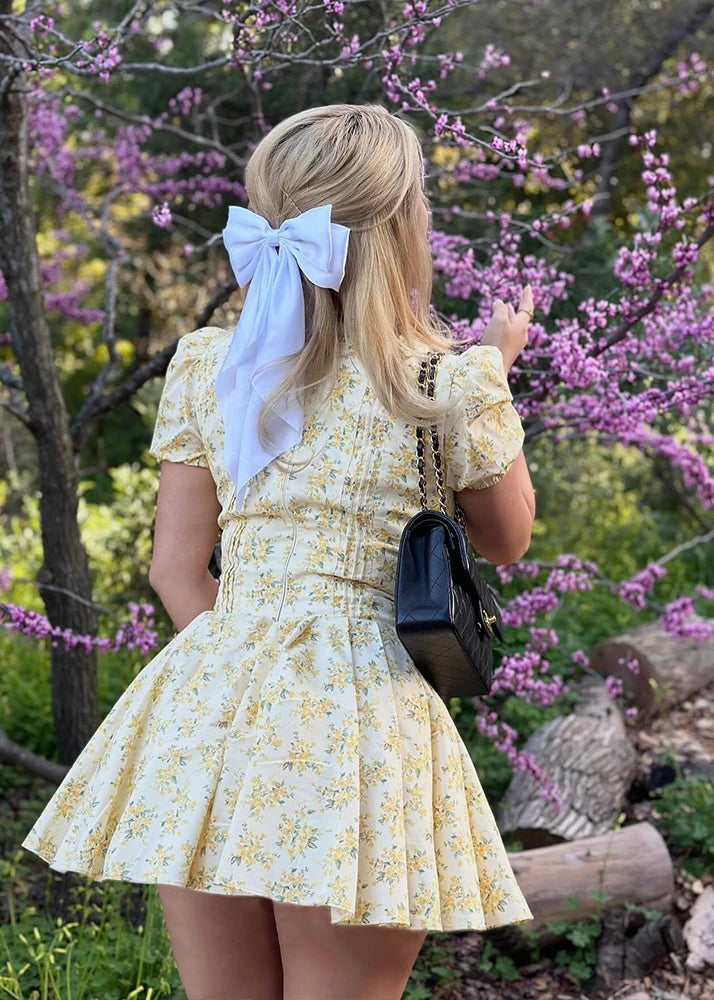 Gele bloemenprint jurk v hals mini