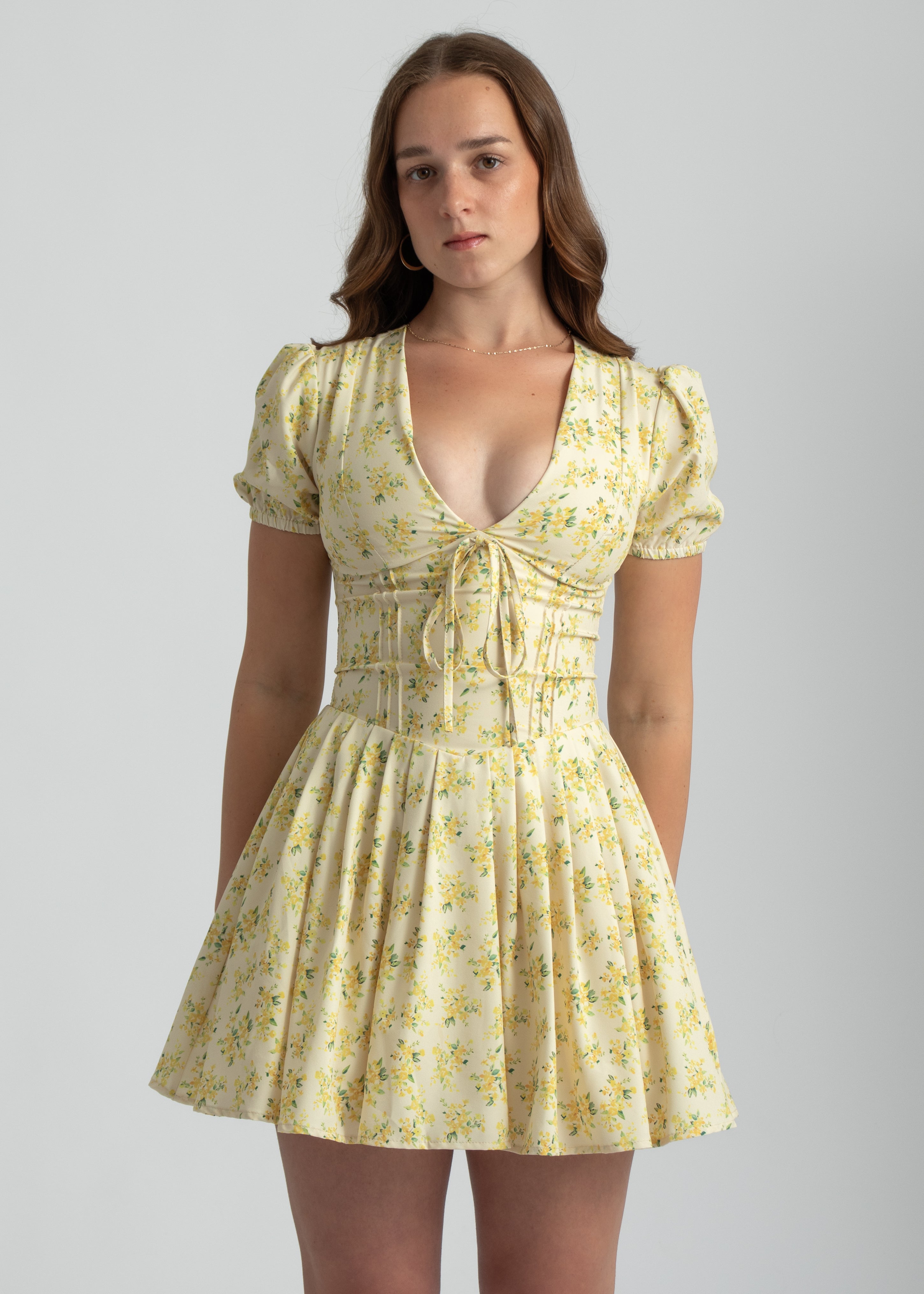 corset bloemenprint mini zomer jurk geel met mouwen en v-hals