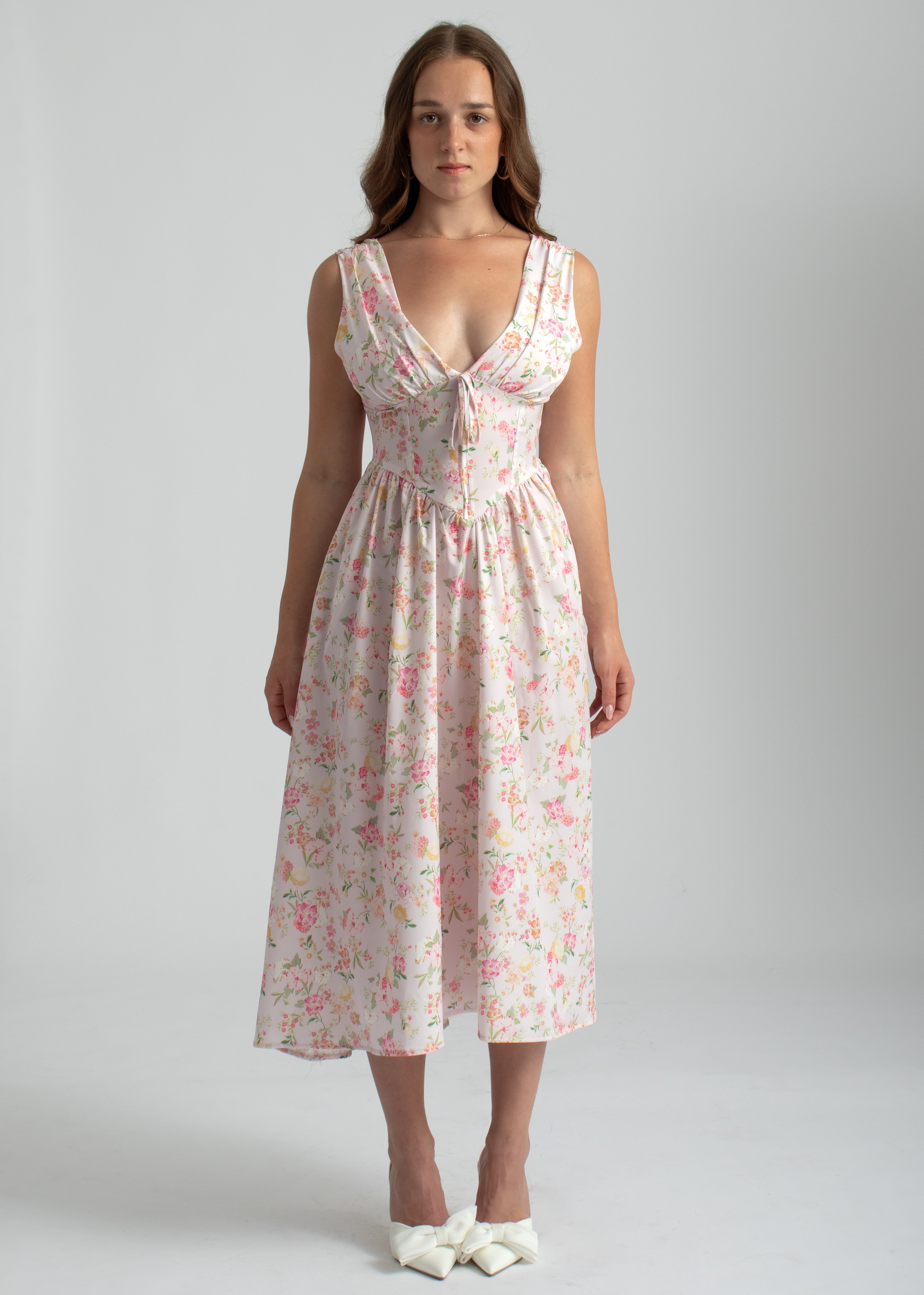 bloemenprint midi jurk roze lage hals met zakken