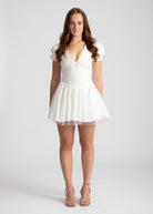 corset mini zomer jurk wit met mouwen en v-hals