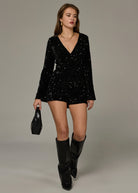 zwarte lange mouwen jumpsuit met v-hals en sequins 