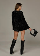 zwarte lange mouwen jumpsuit met v-hals en sequins 